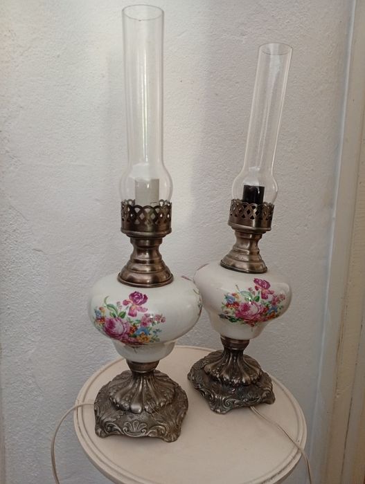 Vintage candlesticks with tin bases.