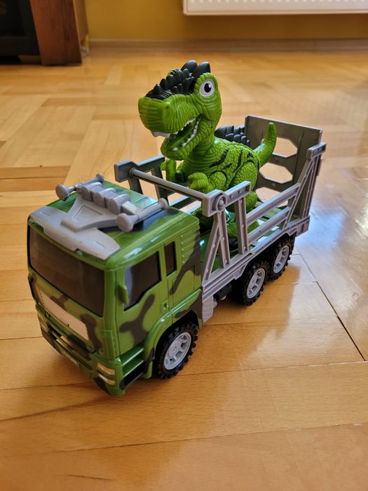 Zabawka dinozaur i auto