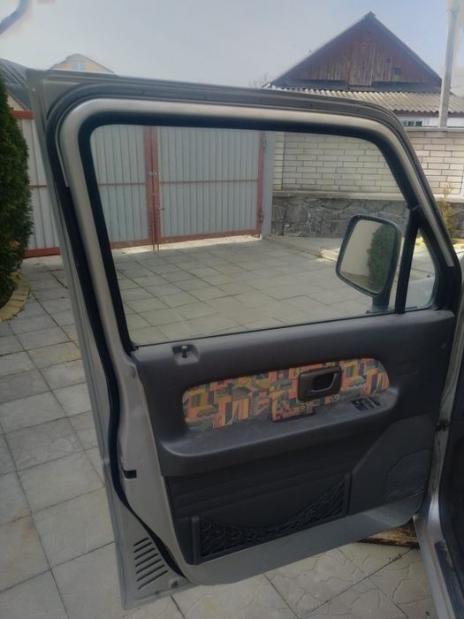 Двері автомобільні Сузукі вагон