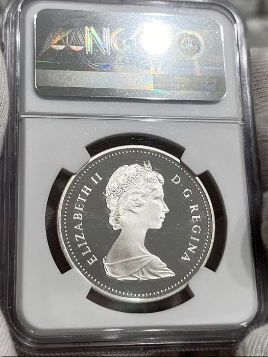 Долар 1983р. Канада, Xll Універсіада в Едмонтоні. СРІБЛО. СЛАБ.