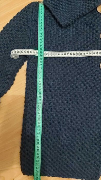 Жіночий в'язаний жакет