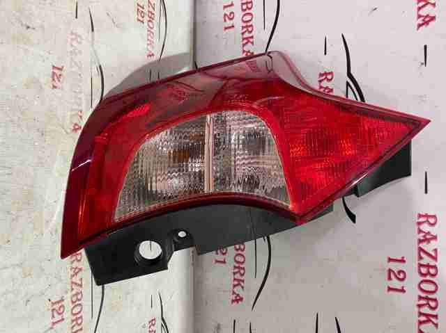 Фонарь задний левый nissan versa правий лівий разборка