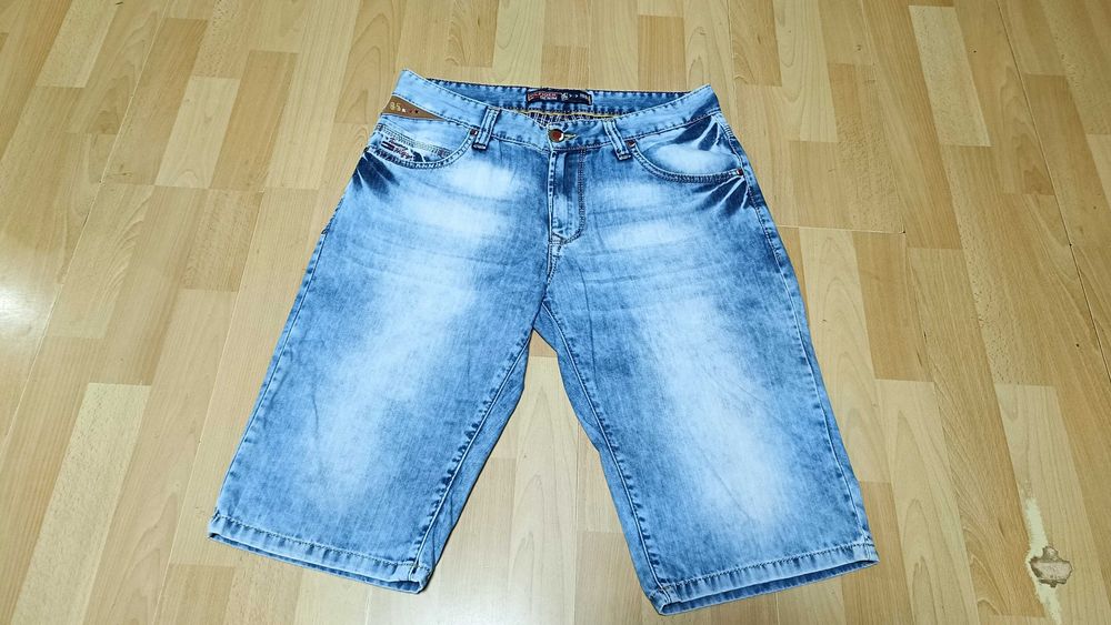 Męskie spodnie jeansowe TOMMY HILFIGER r.L (W33) stan bardzo dobry