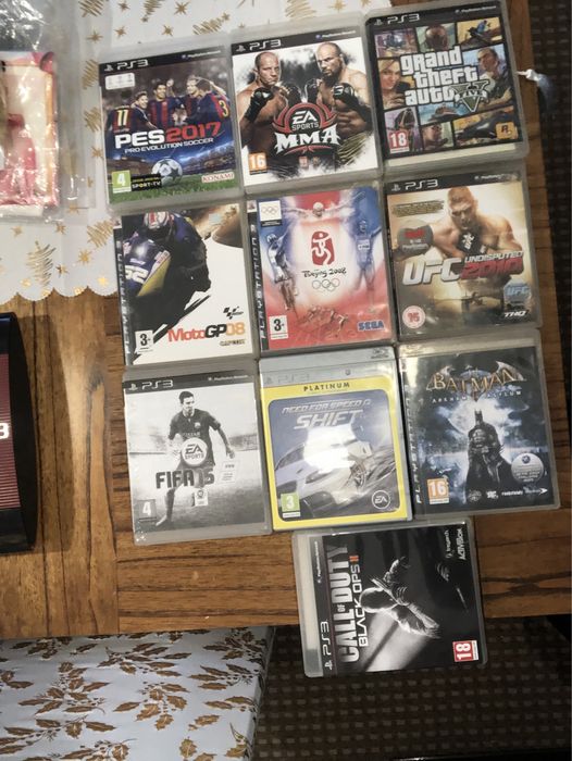 Ps3 mais 10 jogos e cabo de carregar comando