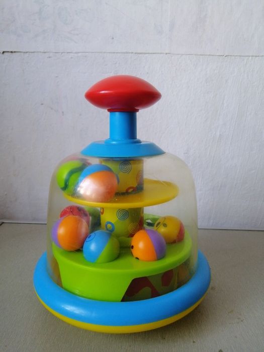 Дзига з кульками