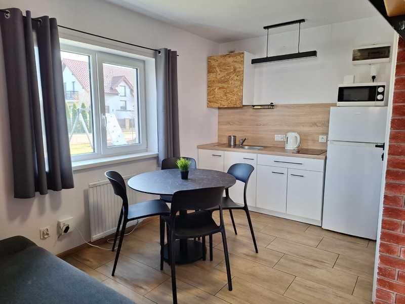 Domki pokoje apartamenty Powidz
