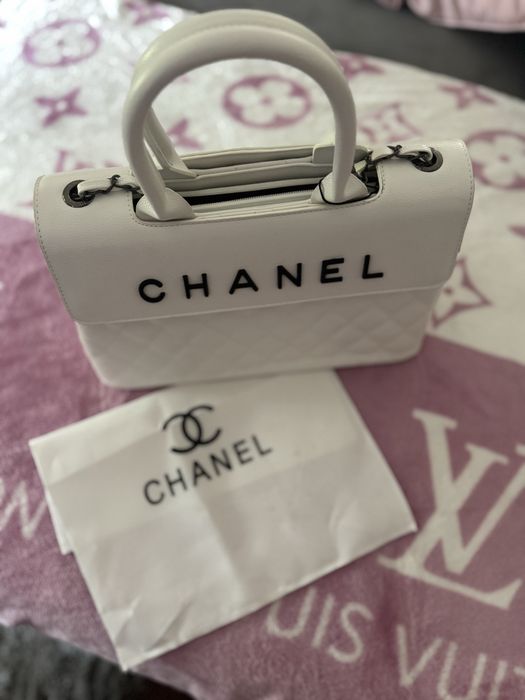 Mala chanel pele caviar branco