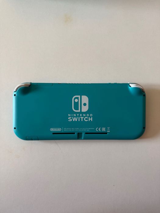 Nintendo Switch Lite c/película de vidro + capas