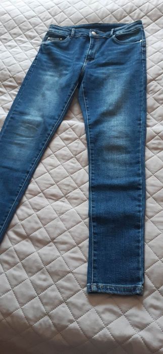 Jeansy jak nowe 31