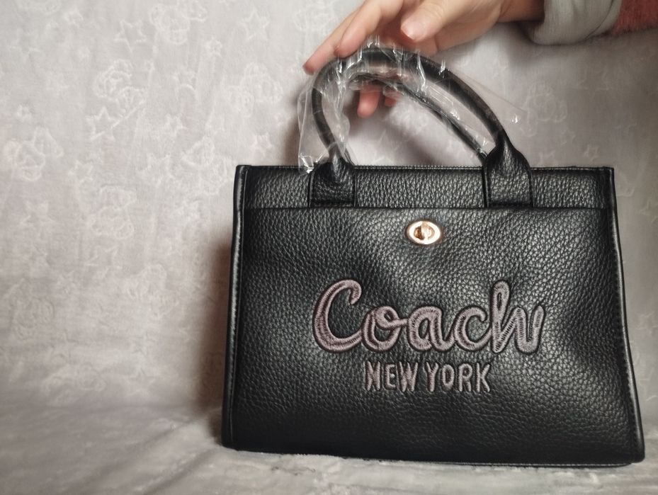 Mala preta da coache