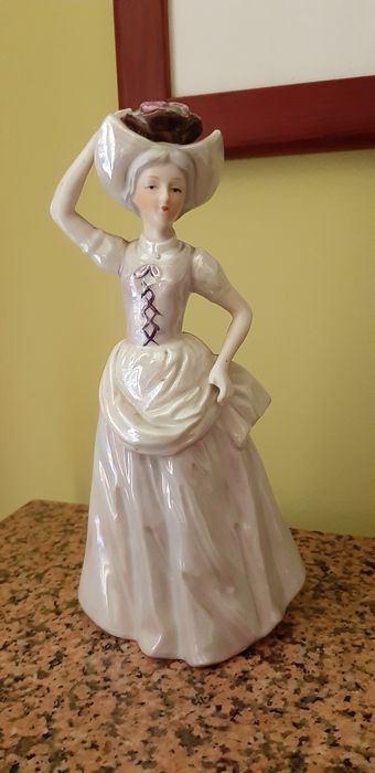 Boneca porcelana