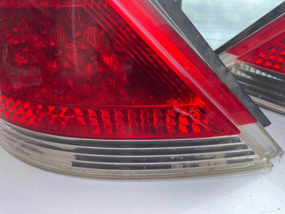 Bmw 7 e65 przed LIFT lampa lewy prawy tył w błotnik biały kierunek