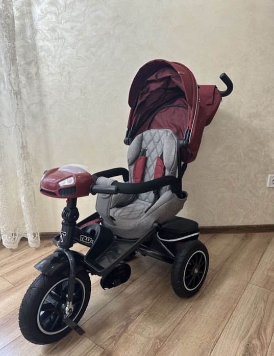 Триколісний велосипед з батьківською ручкою