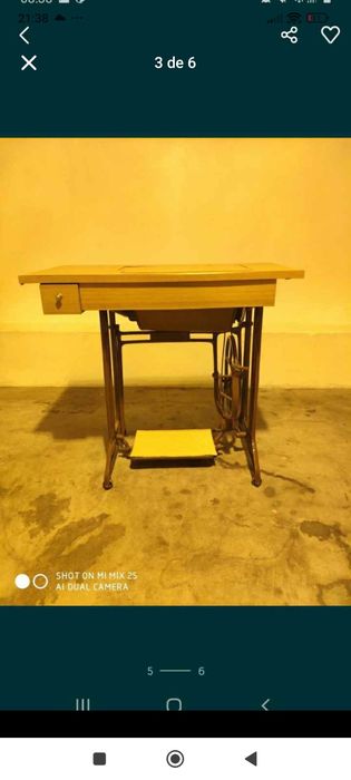 Máquina de costura singer