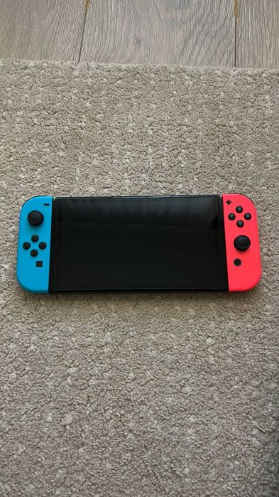 Nintendo Switch Completa (V2) + Mala + Pack 8 Jogos (Ótimo Estado)