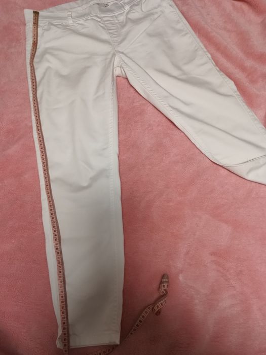 Białe spodnie 3/4 Clockhouse 40