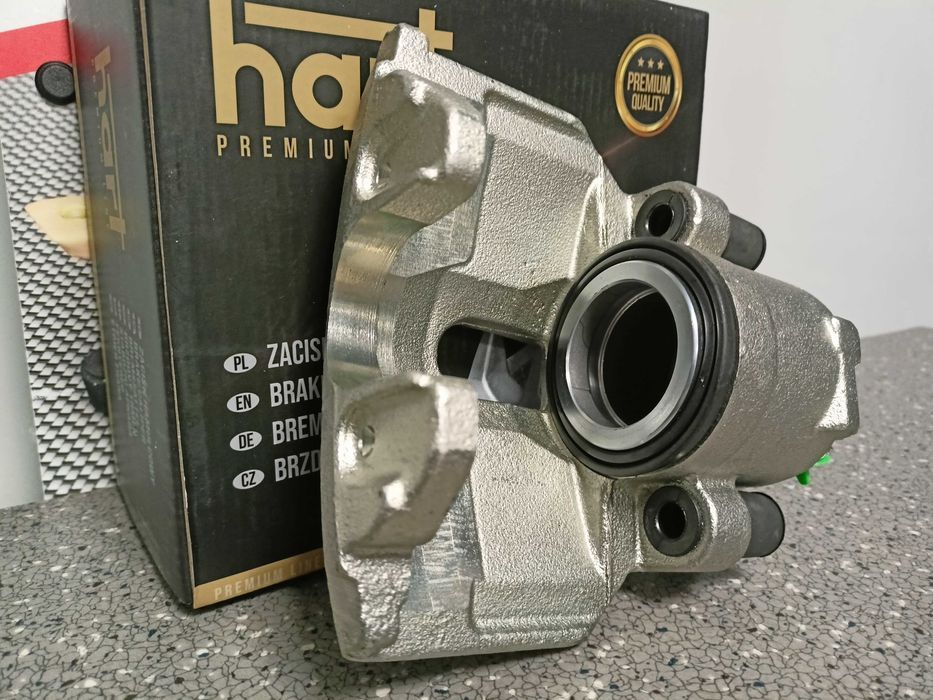 Audi A4,A6,Superb,Passat B5 Zacisk hamulcowy przód lewy PREMIUM.>