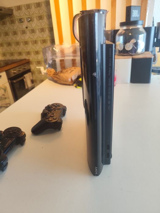 PS3 Super Slim + DualShock 3 Original + GTA V