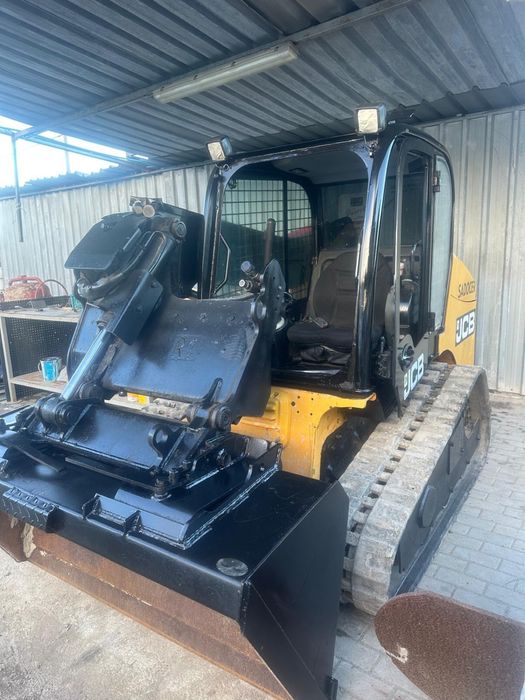 JCB de rastos pa carregadora