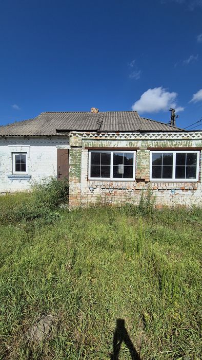 Продаж будинку  центр с. Томилівка.  Фасад.