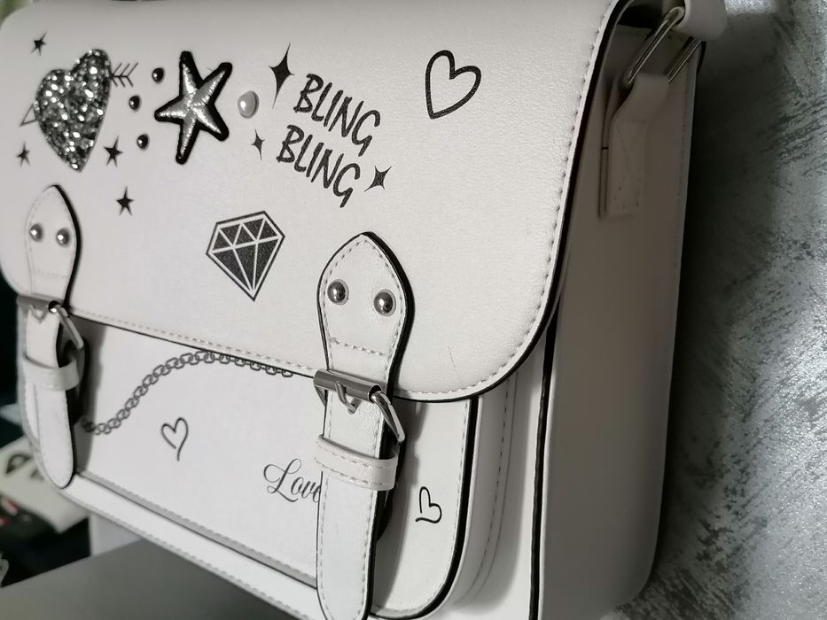 Nowa listonoszka większa z metką