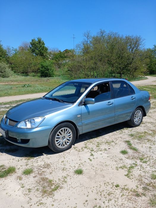 Mitsubishi Lancer АКПП. Газ бензин 1.6.Можливий обмін