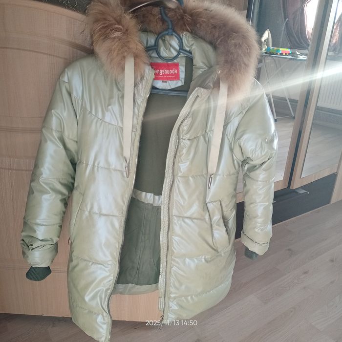 Зимова теплюща  курточка