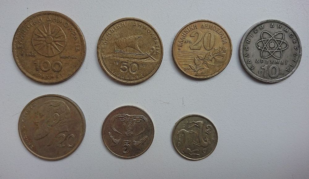 Набор из семи монет Греции и Кипра.