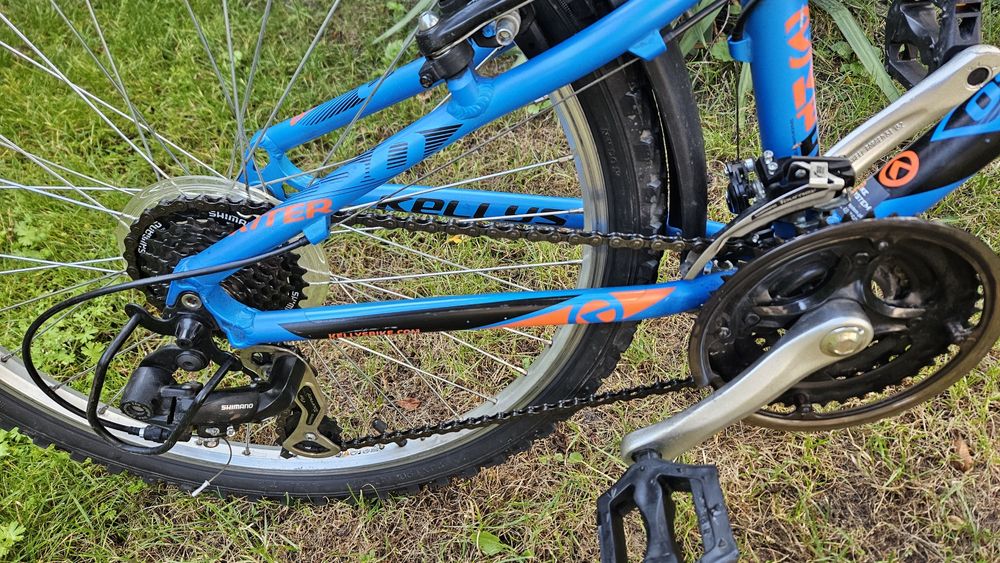 Rower młodzieżowy Kellys Kiter 24" – amortyzator, Shimano, błotniki