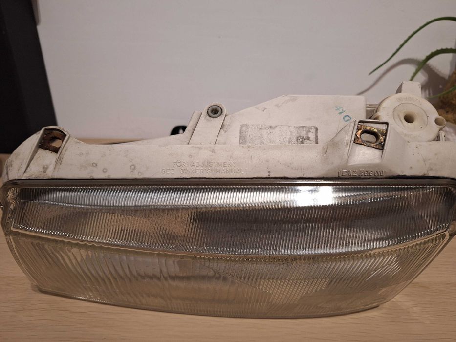 Reflektor lewy, VW Passat B4 Hella