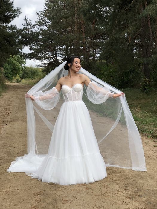 Весіллна сукня в ідеальному стані