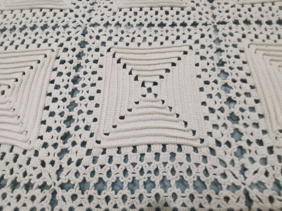 Colcha de renda feita à mão