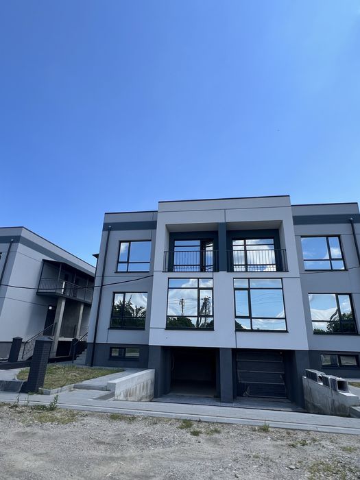 Таунхаус 125 м² з гаражем біля озера — за ціною 2-кімнатної квартири