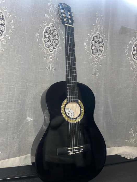 Vendo Guitarra + saco + afinador e palhetas