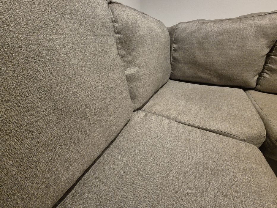 Sofá cinza de canto