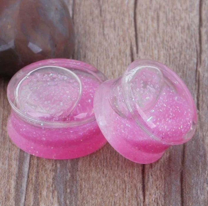 Piercings brincos plugs tuneis alargadores janelas expansores orelha