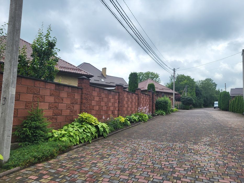 Продам  Новий будинок з ремонтом + ділянка 8 сот