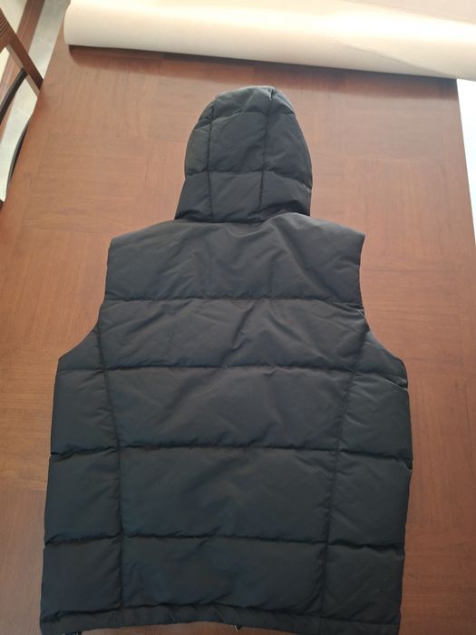 Colete com capuz impermeável