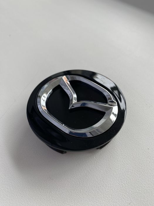 Колпачки в центр колеса Mazda 57мм/49мм (заглушки)