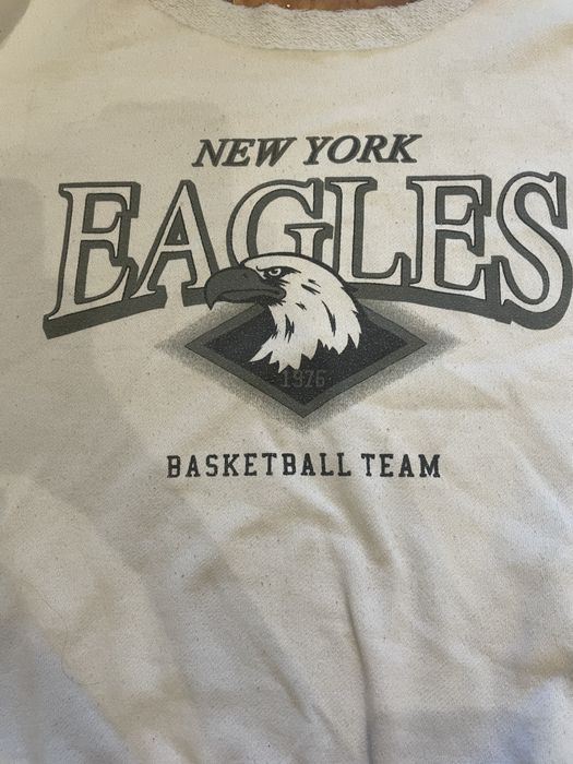 Серая кофта с открытыми плечами с орлом