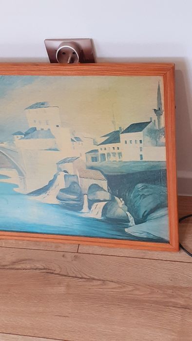 Obraz Widok miasta z prl ma długości 85cm wys 44 cm