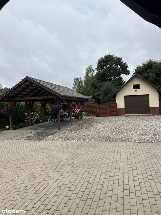 podwójny dom na Mazurach duża działka dwa garaże wiata