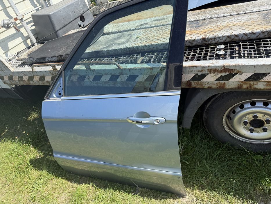 Drzwi Ford Galaxy mk3  lakier 86 lewe szyba drzwi