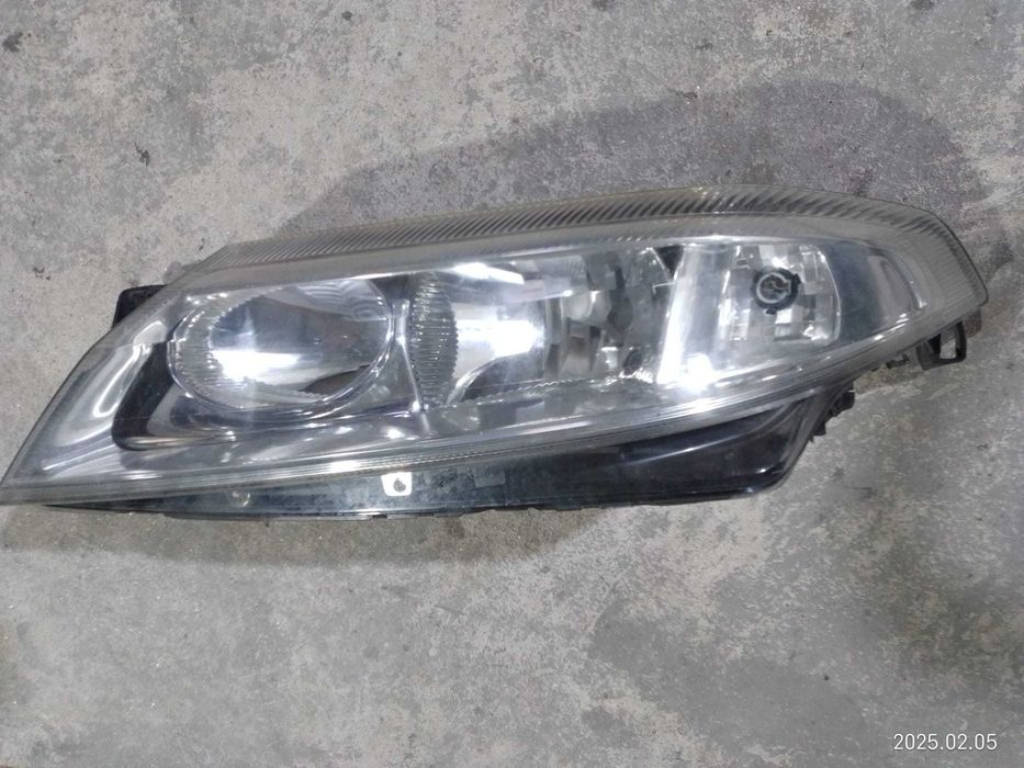 Otica farol drt e esq Renault Laguna II