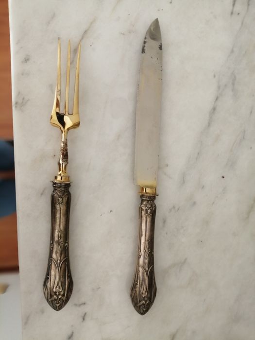 Talheres vintage com cabo em prata.