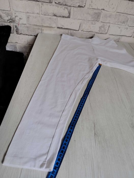 bawełniane krótkie białe legginsy 3/4 za kolano M/L na gumce rybaczki