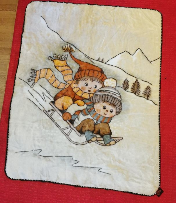 Sliczny kocyk dzieci na sankach