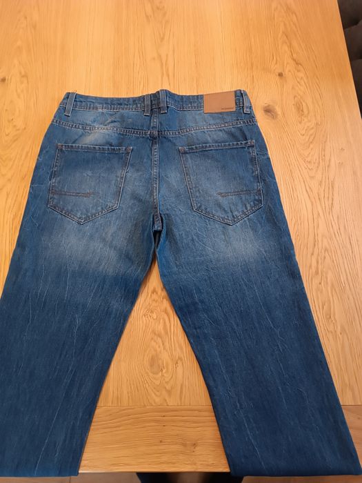 Spodnie Reserved męskie jeans