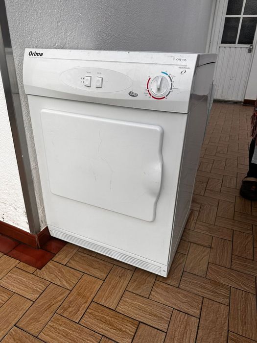 Máquina de secar avariada