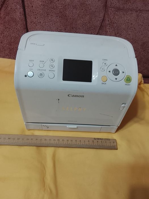 Фото принтер Canon SELPHY ES20. Компактный. Переносной. От любых носит
